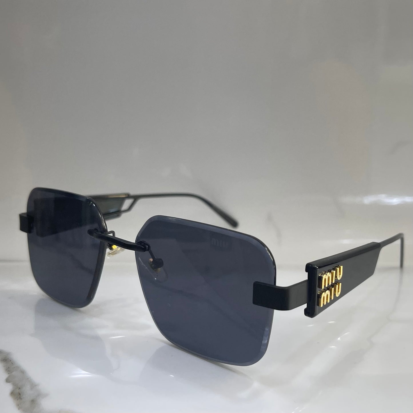 Miu Miu Black Gold M33 2026