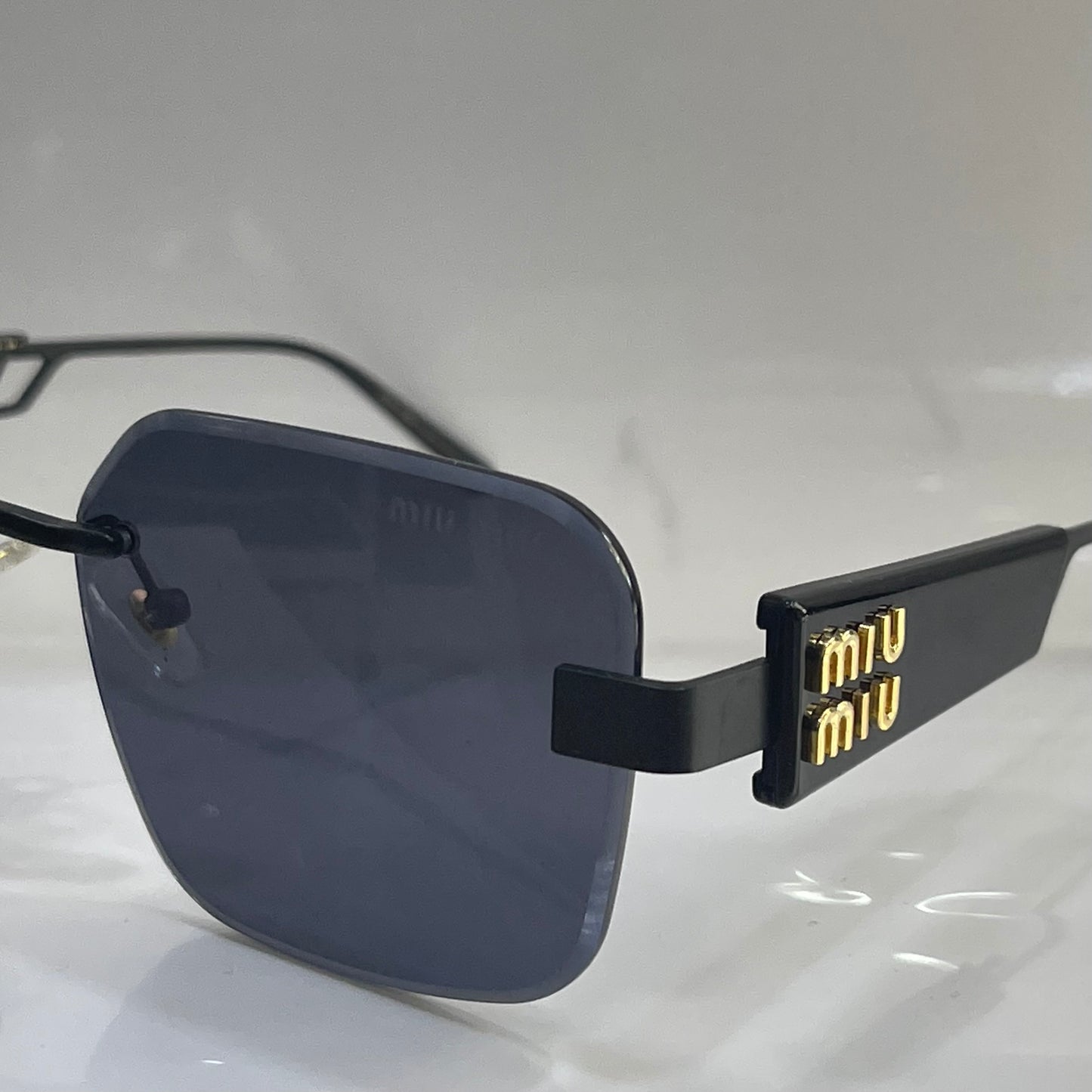 Miu Miu Black Gold M33 2026