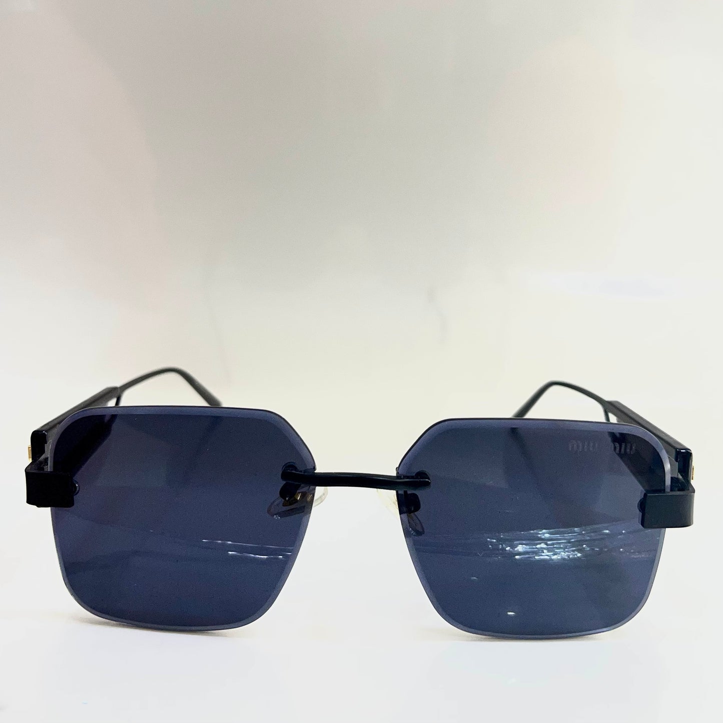 Miu Miu Black Gold M33 2026