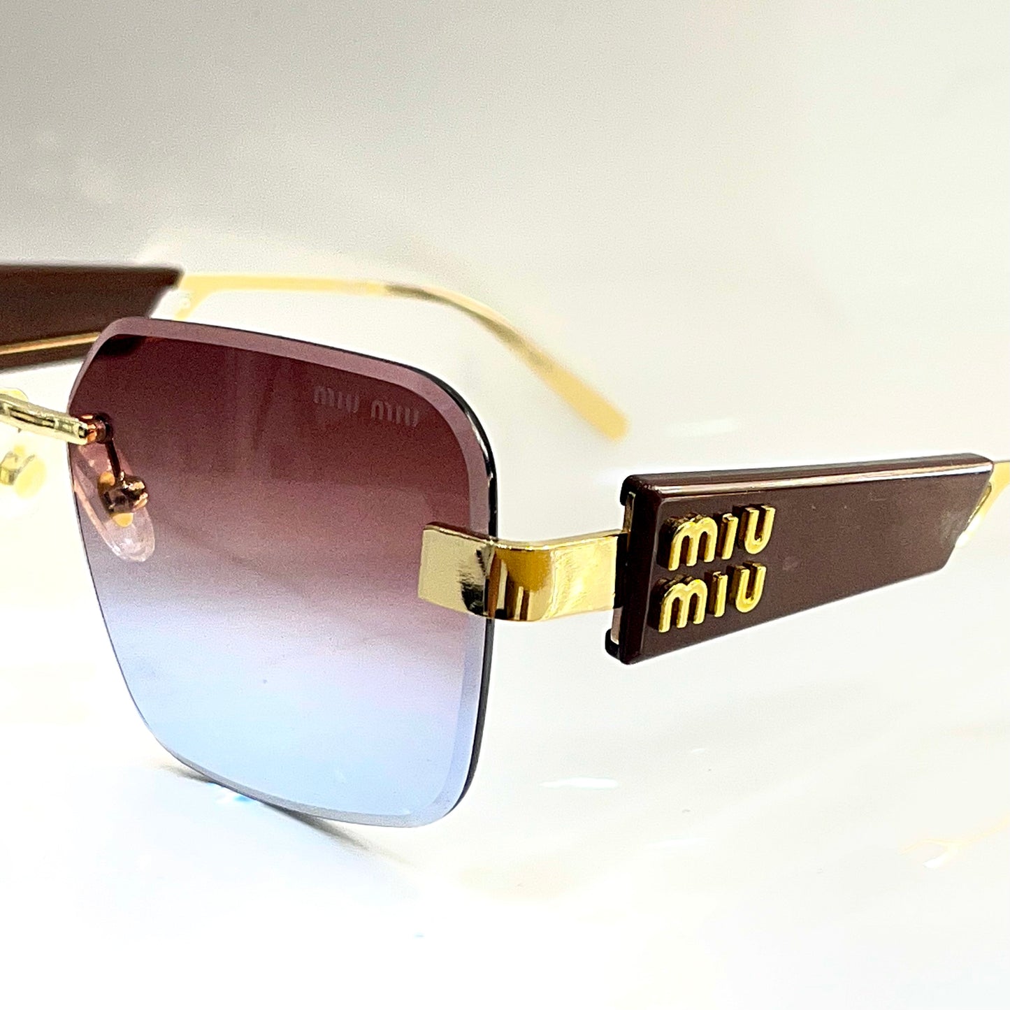 Miu Miu Brown Gold M34 2026